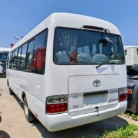 Mini-bus Toyota Coaster 23-30 places, diesel/essence, pour le tourisme et les trajets quotidiens, fourni directement par l'usine