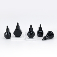 Flacon compte-gouttes en verre opale noir brillant de 30 ml, emballage cosmétique premium pour sérum, idéal pour les marques de produits de beauté et de soins de la peau.