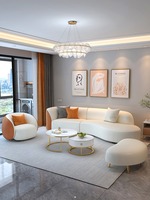 Sofa incurvé simple moderne et table de thé ensemble pour petit appartement salon