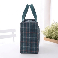 Sac fourre-tout moyen à carreaux OEM ODM en tissu imperméable avec doublure TC, taille personnalisée pour les trajets quotidiens, le déjeuner et l'usage quotidien