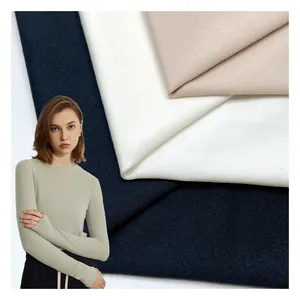 Bon élastique dbp 87% polyester 13% spandex tricoté doux double brossé simple jersey DTY tissu pour vêtements de détente
