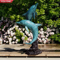 Statue de dauphin en bronze pour piscine extérieure