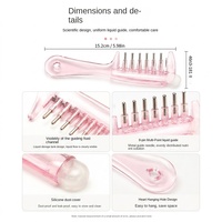 Peigne applicateur transparent à dents larges pour soins du cuir chevelu et des follicules pileux, idéal pour l'application d'huiles essentielles