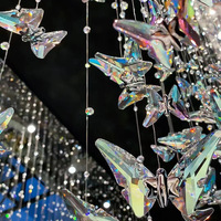 Lustre long en spirale papillon de conception italienne, décoration en cristal K9, luminaire de luxe en cristal pour villa duplex