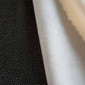 Thinh Gia Huy marque 100% Polyester Non-tissé fusible entoilage tissu élastique pâte point unique adhésif pour vêtements fabriqués - Product Image 1