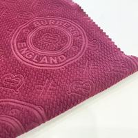 ANONO Lots excédentaires de haute qualité Polyester Spandex bulle gaufré tissu tricoté vêtements de sport tissus textiles élastiques pour manteau