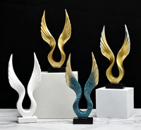 Décoration Moderne pour la Maison : Figurine Ailes d'Ange et Ailes d'Aigle en Résine Dorée pour Salon, Bureau et Intérieur