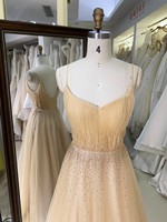 Robe de Soirée 2026 Nouvelle Collection en Gros Champagne Coupe A-Line Longue Élégante en Tulle Col V Bretelles Fines pour Anniversaire Femme