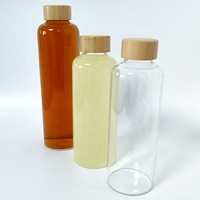 Bouteille d'eau et de jus en verre borosilicate portable avec bouchon hermétique en bambou pour l'école, la maison, le bureau, les voyages et le sport