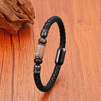 Bracelet en cuir tressé artisanal unisexe avec perles en pierre naturelle, fermoir magnétique en acier inoxydable, style minimaliste et épuré