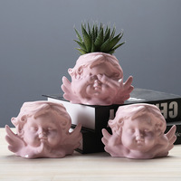 Pots de fleurs décoratifs de style européen en céramique émaillée, en forme de chérubin, pour l'intérieur