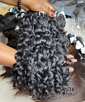 Vente en gros d'usine de cheveux vietnamiens bruts Sexy Lady cheveux birmans bouclés cheveux cambodgiens ondulés