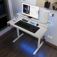 Vente en gros Bureau ergonomique électrique réglable en hauteur pour ordinateur de jeu blanc avec étagère de rangement