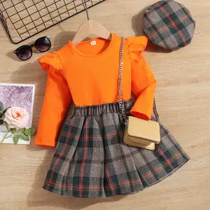 New style autumn girls Solid color simple long-sleeved flying sleeve top and dark plaid skirt dark plaid skirt two-piece set