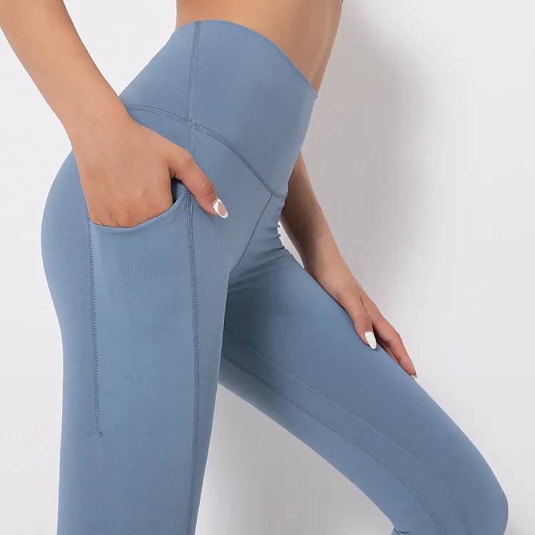 Mallas de entrenamiento para mujer, pantalones de Yoga con bolsillo, cintura alta, Color sólido