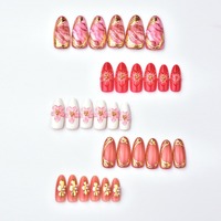 30 faux ongles en amande rouges premium avec fleurs 3D dorées à effet ombré