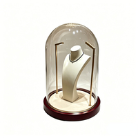 Vitrine à bijoux en acrylique de luxe avec éclairage LED, couvercle en forme de cloche, base en acier inoxydable, pour boutique haut de gamme