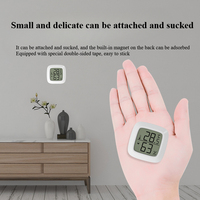 Mini hygromètre numérique HD d'intérieur, thermomètre à bas prix, capteur de température et d'humidité avec design souriant, fabriqué en plastique
