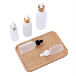 บรรจุภัณฑ์เครื่องสำอางแก้วฝ้าแบบหรูหราขนาด 30 มล. 50 มล. พร้อมฝาไม้ไผ่สำหรับครีม ขายส่ง - Product Image 4