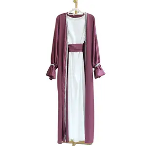 Robes pour femmes de Dubaï, Turquie Cardigan à petites manches évasées et perlées de couleur unie Abaya pour femmes musulmanes