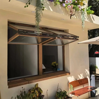 Fenêtres pliantes modernes en aluminium à double fond supérieur pour cuisine, hôtel, café, ouverture verticale, type rideau pour magasin extérieur