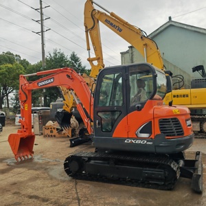 รถขุดไฮดรอลิก Doosan DX60 มือสอง ของแท้จากเกาหลี รถขุดขนาดเล็ก 6 ตัน ยี่ห้อ Doosan เครื่องจักรก่อสร้าง มีสินค้าในสต็อก - Product Image 1