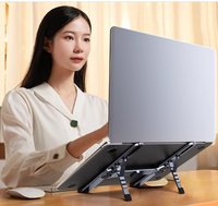 Support pour ordinateur portable en aluminium réglable, mini design pliable avec fonction antidérapante, nouveau produit avec dissipation de chaleur