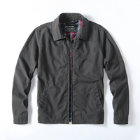 Toile enduite de décoration de bouton d'impression de bouffée de veste bleu marine véritable élégante pour des tenues décontractées d'hiver taille XS ODM