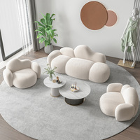 Ensemble de canapés sectionnels en tissu blanc en forme de nuage de luxe moderne style designer créatif avec tables basses meubles de salon d'hôtel