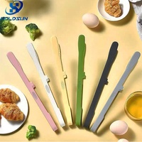 Pince de cuisine multifonctionnelle en silicone résistante à la chaleur avec poignée tridimensionnelle, personnalisable avec logo, en promotion