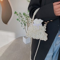 Sac à main mini élégant pour femme en cuir PU avec doublure en PVC, à deux anses perlées et fermeture à cordon, style streetwear
