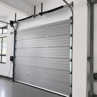Porte sectionnelle industrielle automatique avec dispositif anti-chute et système de contrôle du moteur à démarrage progressif