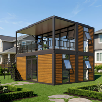Maison préfabriquée modulaire en conteneur avec structure en acier et mur en verre, design moderne, pour bureau de jardin