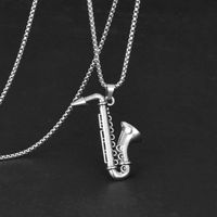 Colliers pendentifs saxophone tendance, style hip-hop, instrument de musique, chaîne de pull unisexe, accessoires délicats Y2K en gros