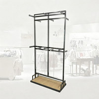 Exhibidor de Ropa Metálico de Doble Cara Personalizado con Base de Madera, Mueble Exhibidor de Prendas para Tiendas de Ropa