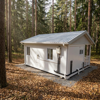 Maison de conteneurs spacieuse et luxueuse avec véranda privée et aménagement personnalisé pour cabane de vacances dans la cour