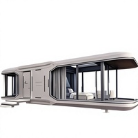 Maison préfabriquée moderne en conteneur, mini-maison capsule spatiale avec balcon