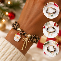 Nouveau design Bracelet tressé en ruban imprimé léopard avec pendentif breloque de Noël Père Noël, étoile, nœud et motif émail goutte d'huile en alliage