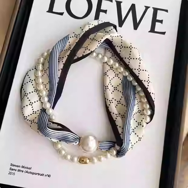 หัวเข็มขัดลูกปัดเพชรยาวลายทางสีฟ้าข้าว