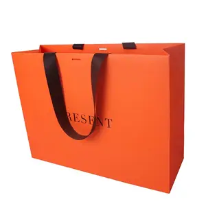 Großhandel individuell bedruckte orange Luxus Schmuck Kleidung Boutique Marke Einzelhandel Verpackung Shopping Geschenk Papiertüte mit Logo