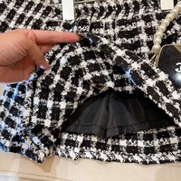 Nouvel ensemble de vêtements pour filles, 2 pièces, veste à carreaux à manches longues et mini-jupe, tenue tendance pour enfants, vêtements de printemps pour bébés