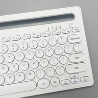 Prix usine 2.4G clavier BT sans fil avec berceau Mini clavier d'ordinateur Portable PC clavier support pour téléphone BT-008