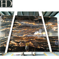 Carreaux brésiliens en granit doré poli Magma naturel noir taureau