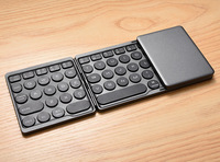 OEM Keyboard BT nirkabel lipat tiga saluran, Keyboard lipat portabel dengan tombol kiri dan kanan