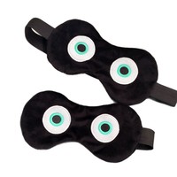 Nouveau masque pour les yeux en polyester noir de style dessin animé en forme d'œuf avec couverture anti-lumière pour dormir - Design amusant en forme d'œuf