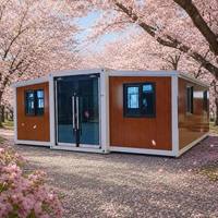 Maison conteneur modulaire extensible à double aile, à structure blanche, avec finition imitation bois, modèle Cabine Fleur de Cerisier Sakura, Vente en gros OEM