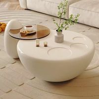 Modernes Skulpturales TUOCHEN Ausziehbares Couchtisch-Set Creme Matt Runde Basis Kunststoff-Oberfläche Kieselsteinförmige Seitenstütze