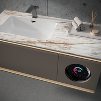 Meuble-lavabo flottant haut de gamme avec éclairage d'ambiance intégré, lavabo, miroir lumineux et design élégant avec finition dorée
