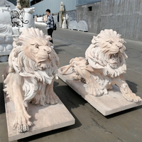 Grande sculpture décorative en pierre naturelle pour l'extérieur Sculpture d'animaux de jardin Statues de lion en marbre grandeur nature à vendre