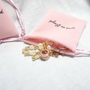 Bolsas de regalo de embalaje de teléfono móvil preciosas reutilizables con logotipo impreso Rosa personalizado, bolsa de joyería de franela contra el polvo con cordón, bolsa de terciopelo